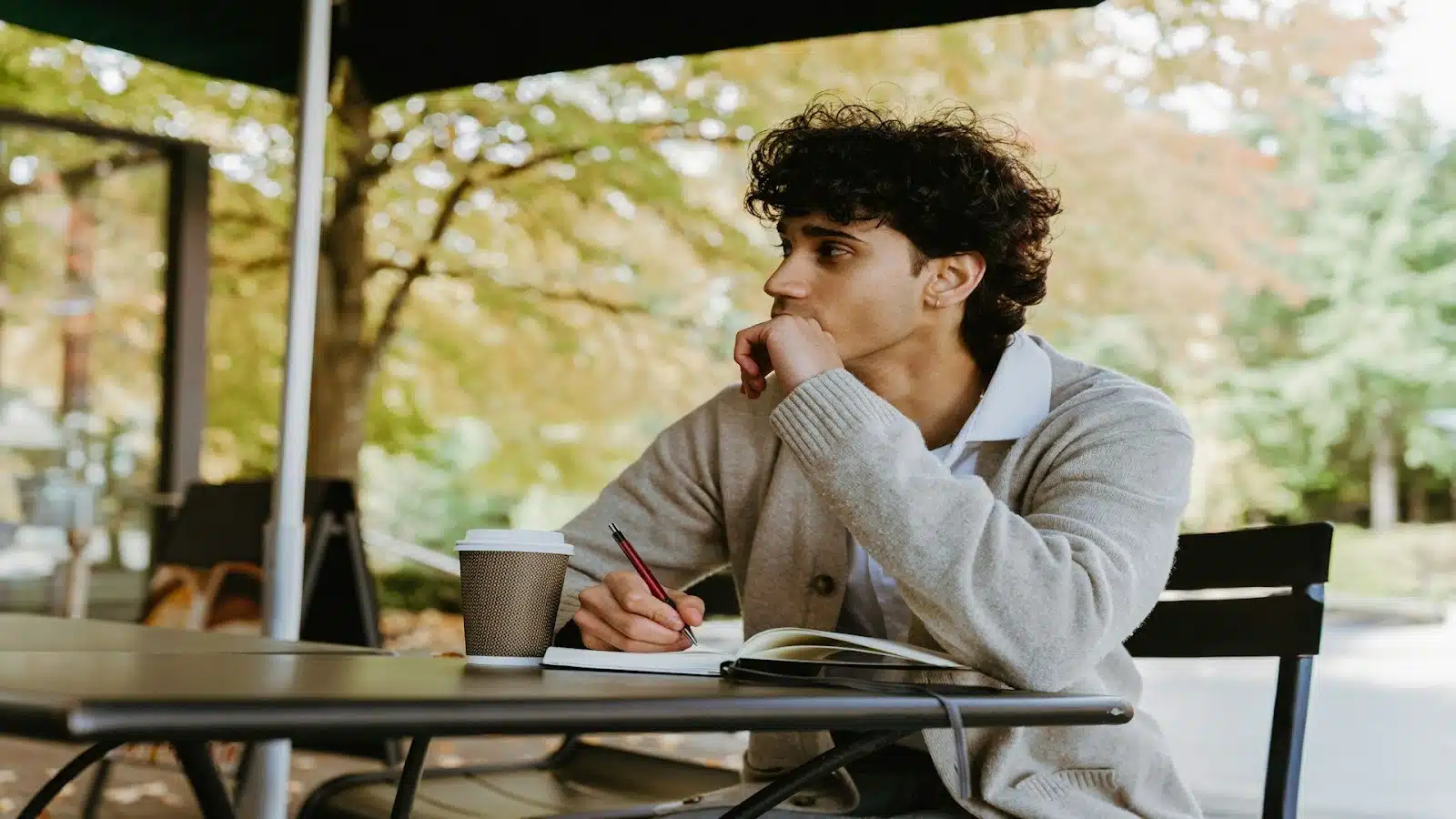 man sitting quietly at café