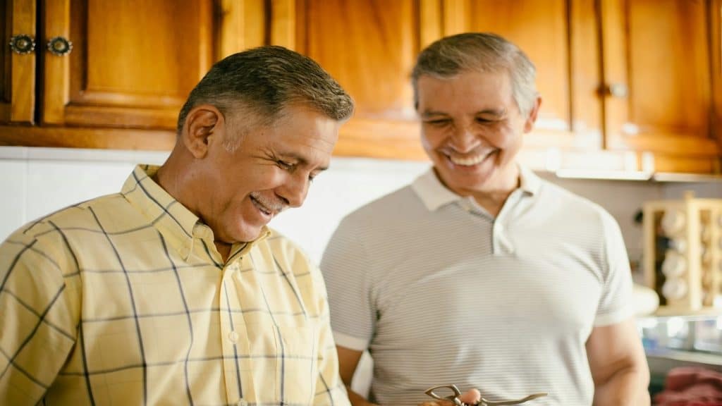 man laughing with friend