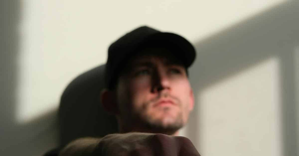 A man wearing a cap