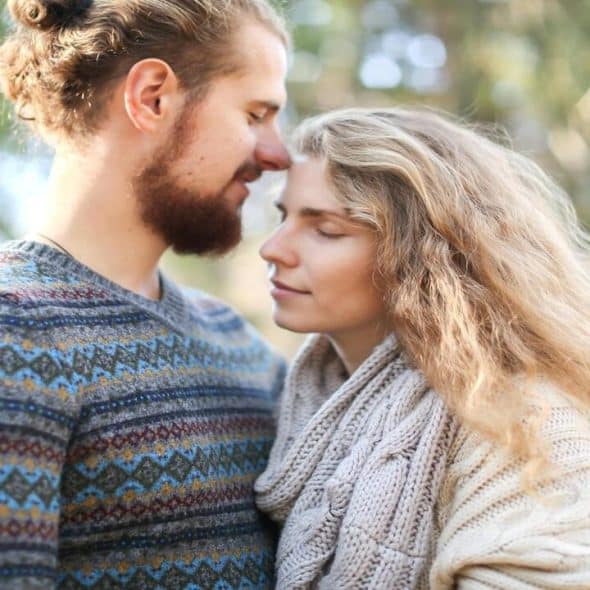 A couple about to hug after a fight