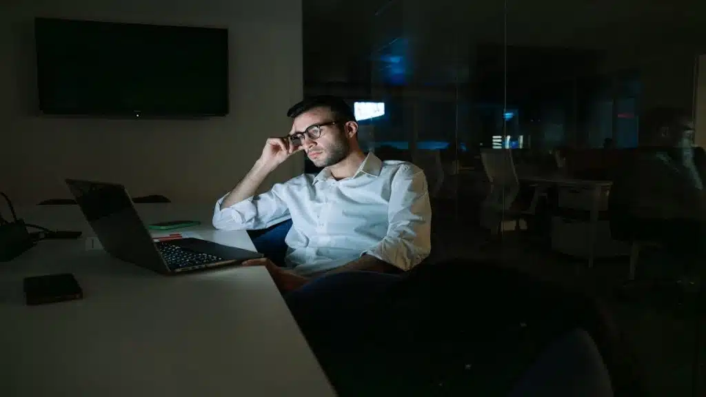 man working late at office