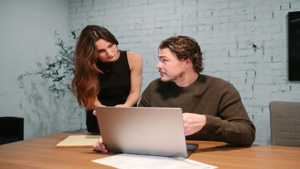 couple discussing finances calmly