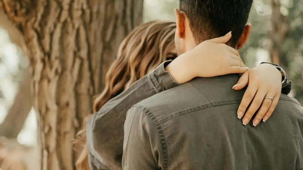 A couple embracing outdoors
