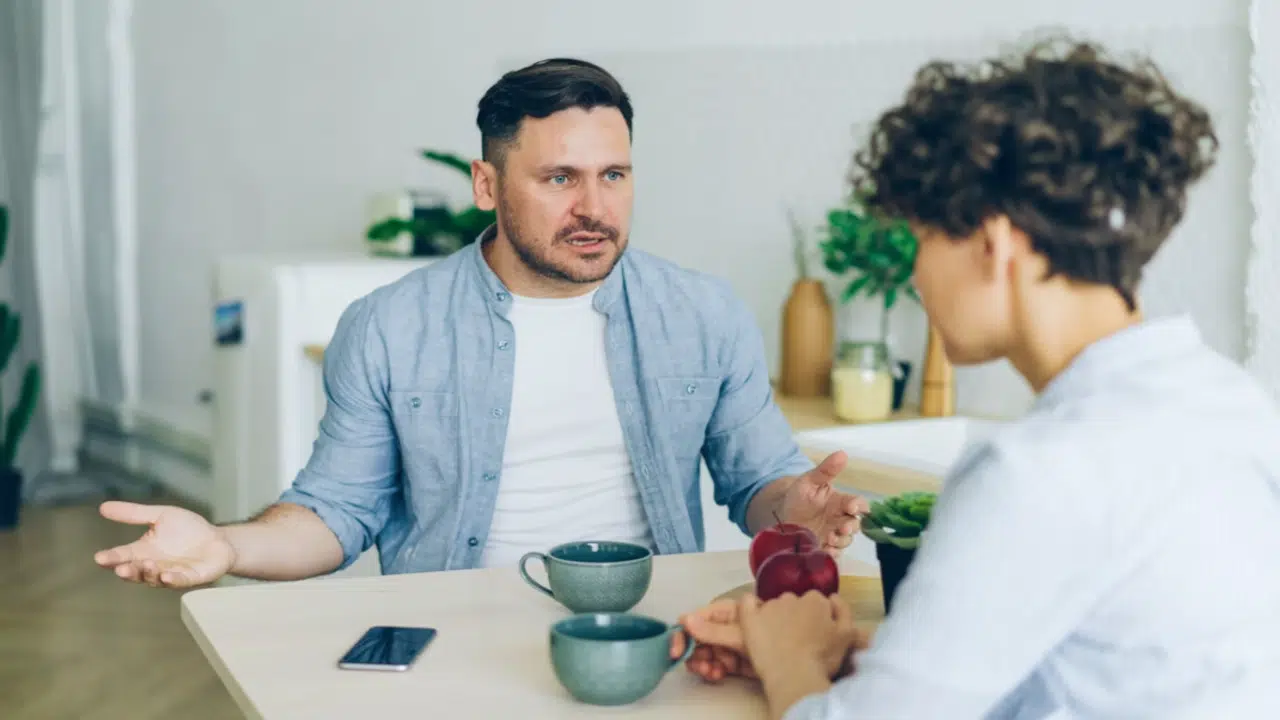 A man berating his partner