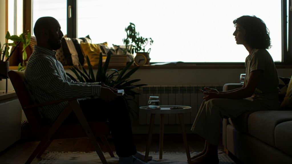 A man and woman talking