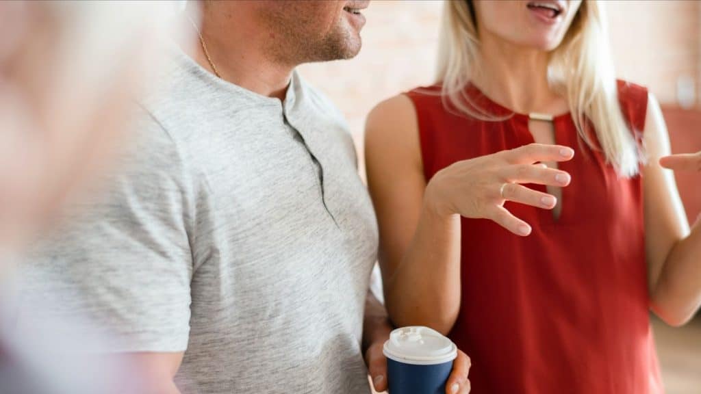 A man and woman talking