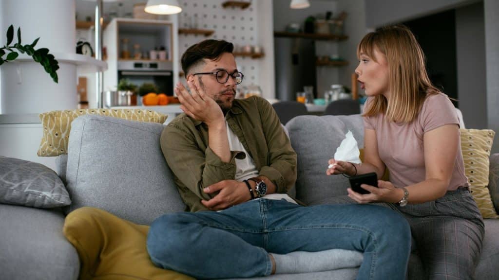 Woman scolding a chill man