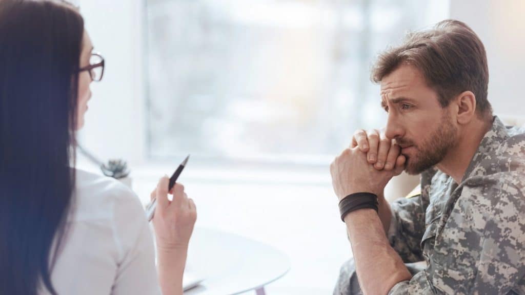 A man listening to woman