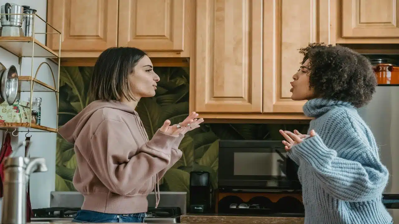Two women having a conflict in the kitchen
