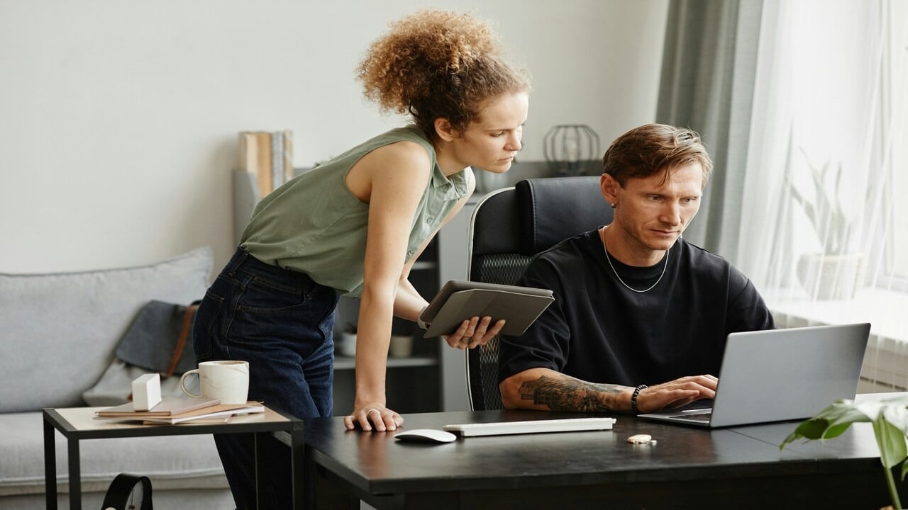 A couple busy working together
