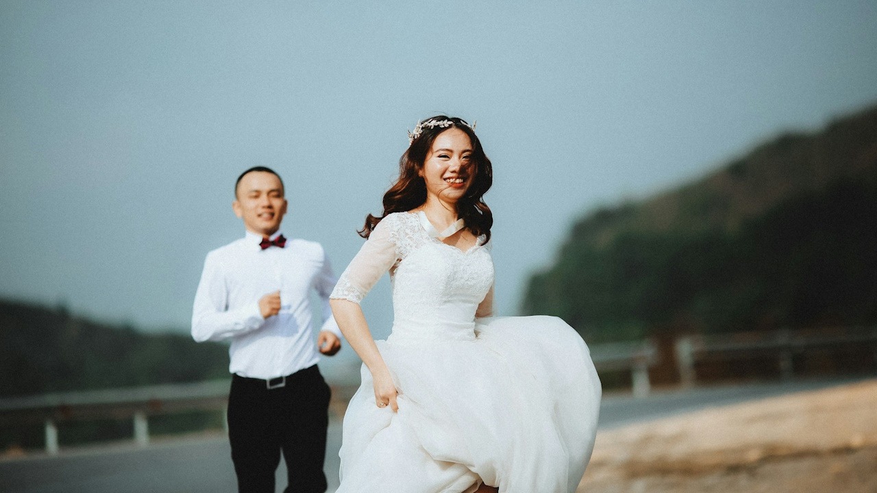 A man chasing a woman during