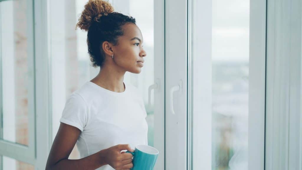person looking thoughtful indoors