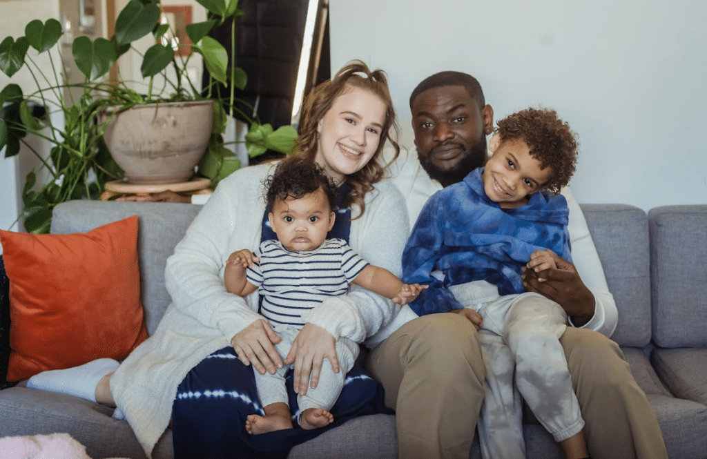 Happy Family Sitting on a Couch