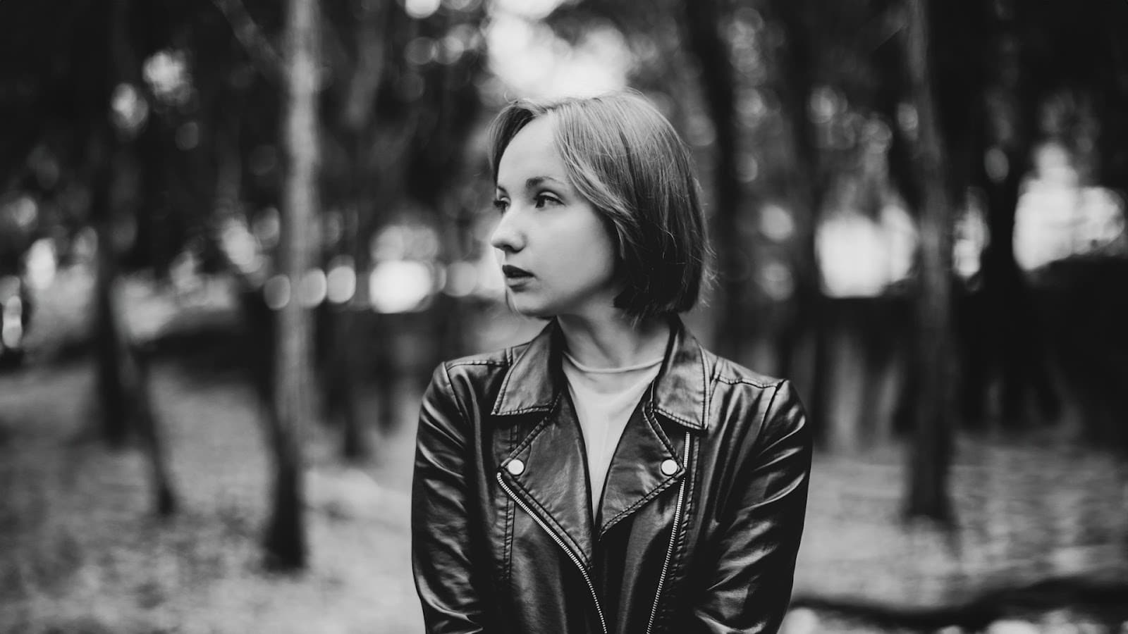 individual reflecting outdoors