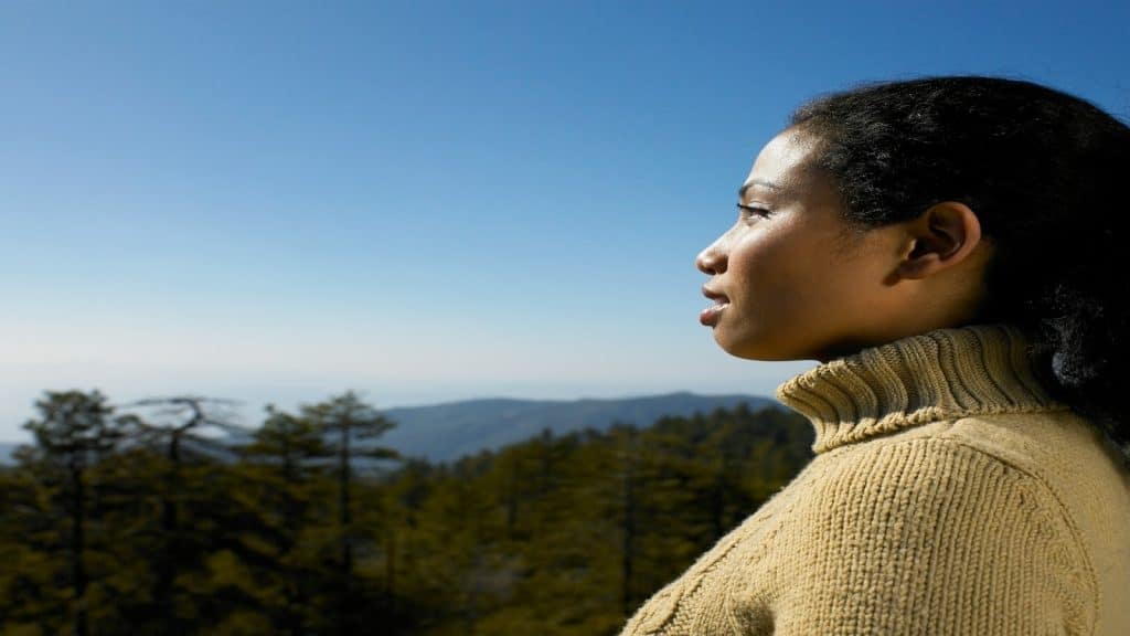 individual looking toward horizon