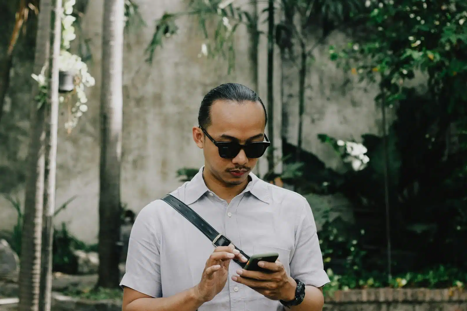 man checking phone