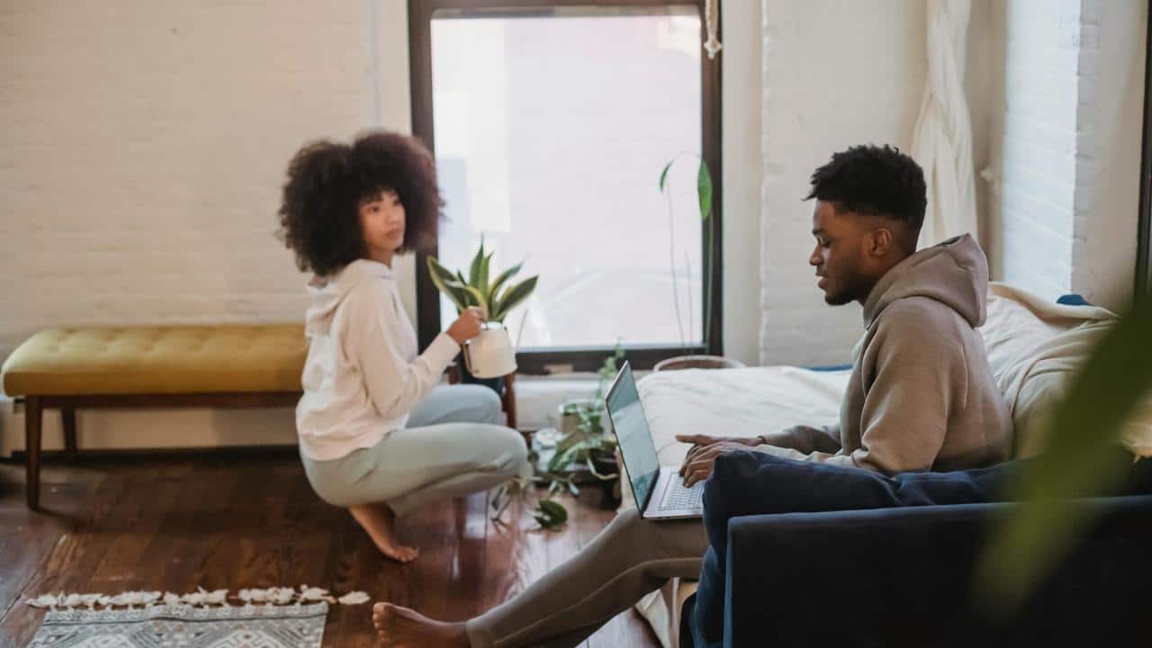A couple relaxing at home
