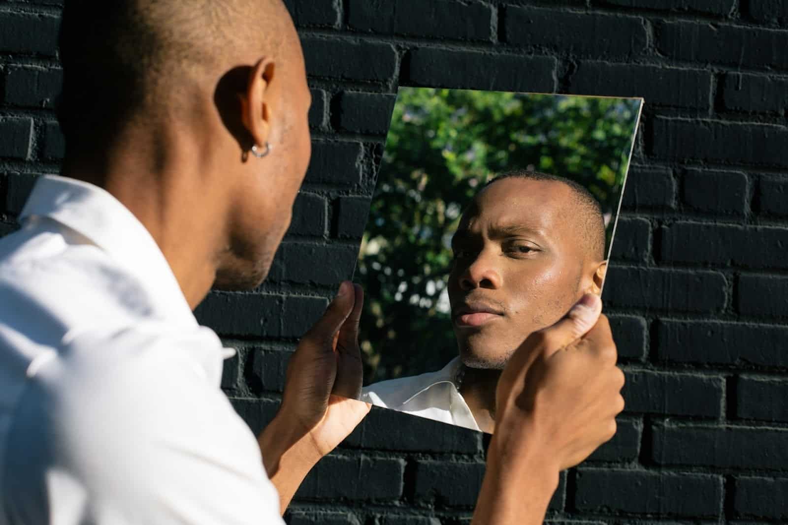 man looking mirror