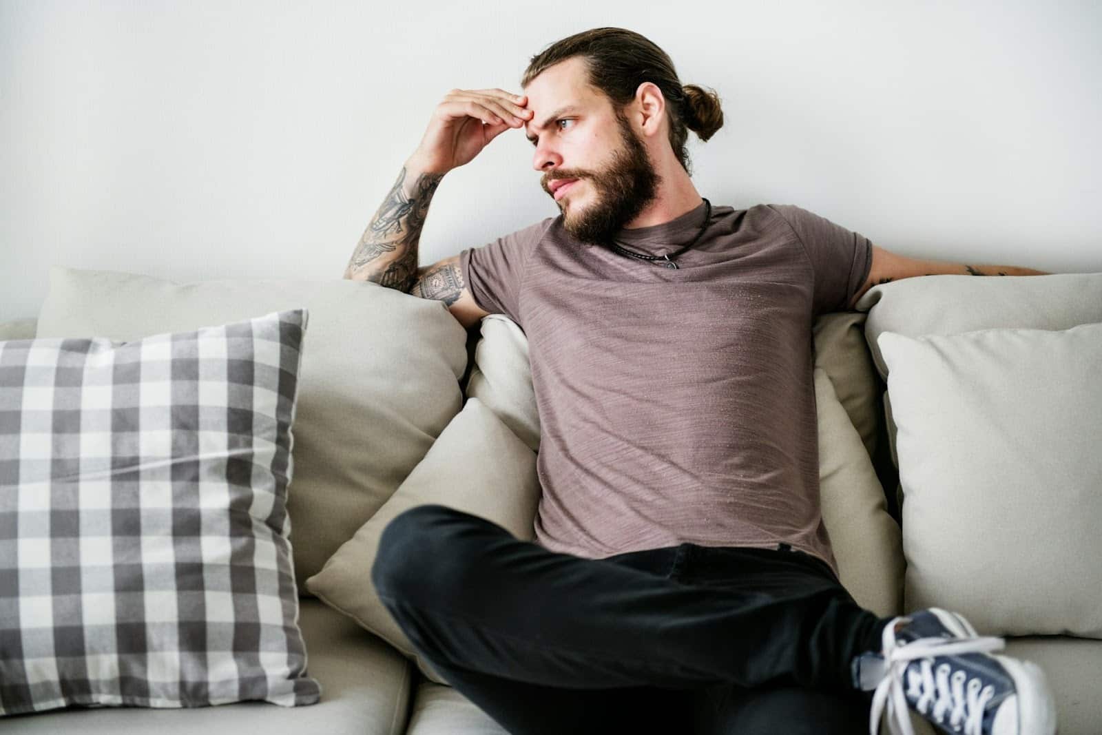 tired man sofa