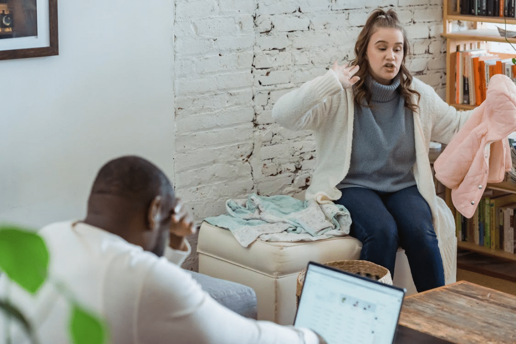 Man hearing complaints from wife frustrated