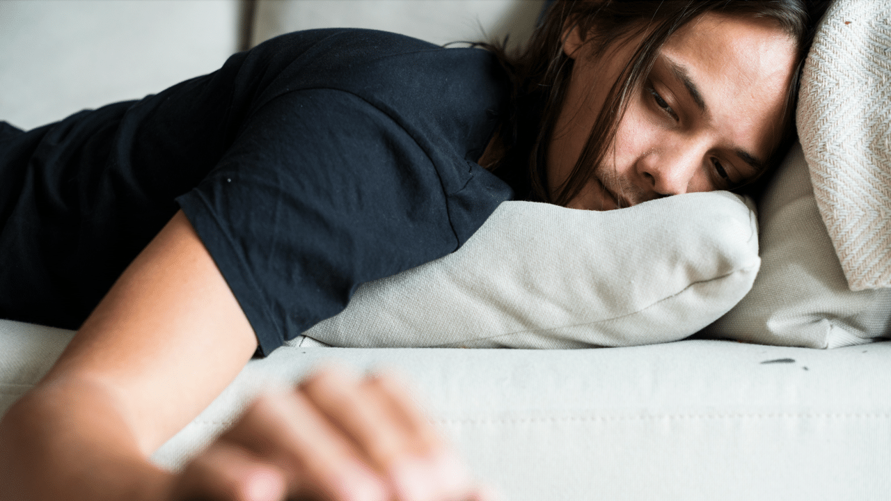 A woman sleeping on the couch