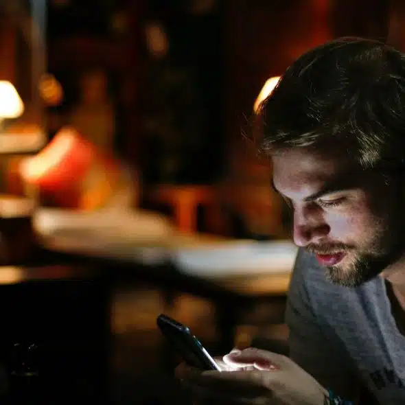 man texting