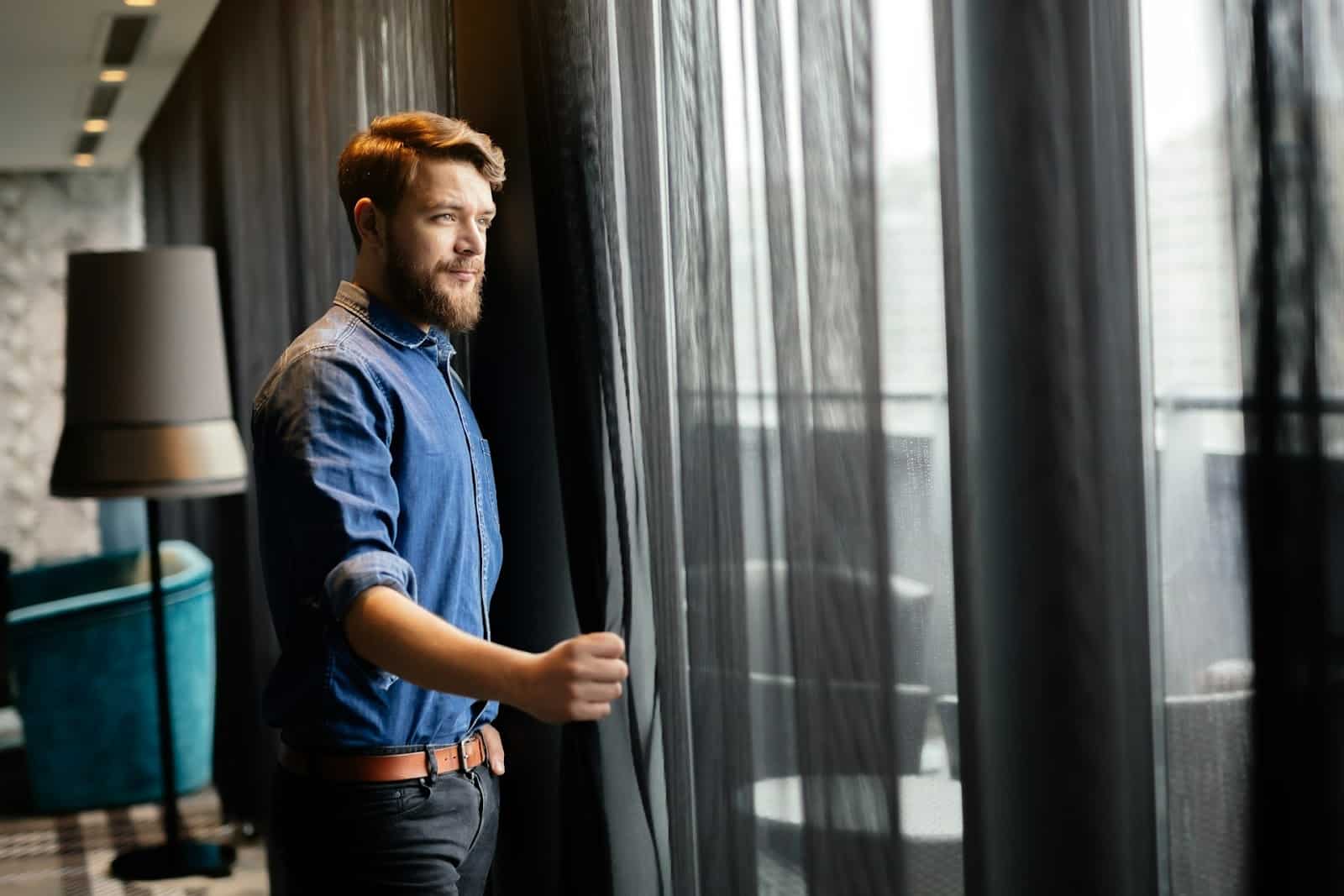 thoughtful man window