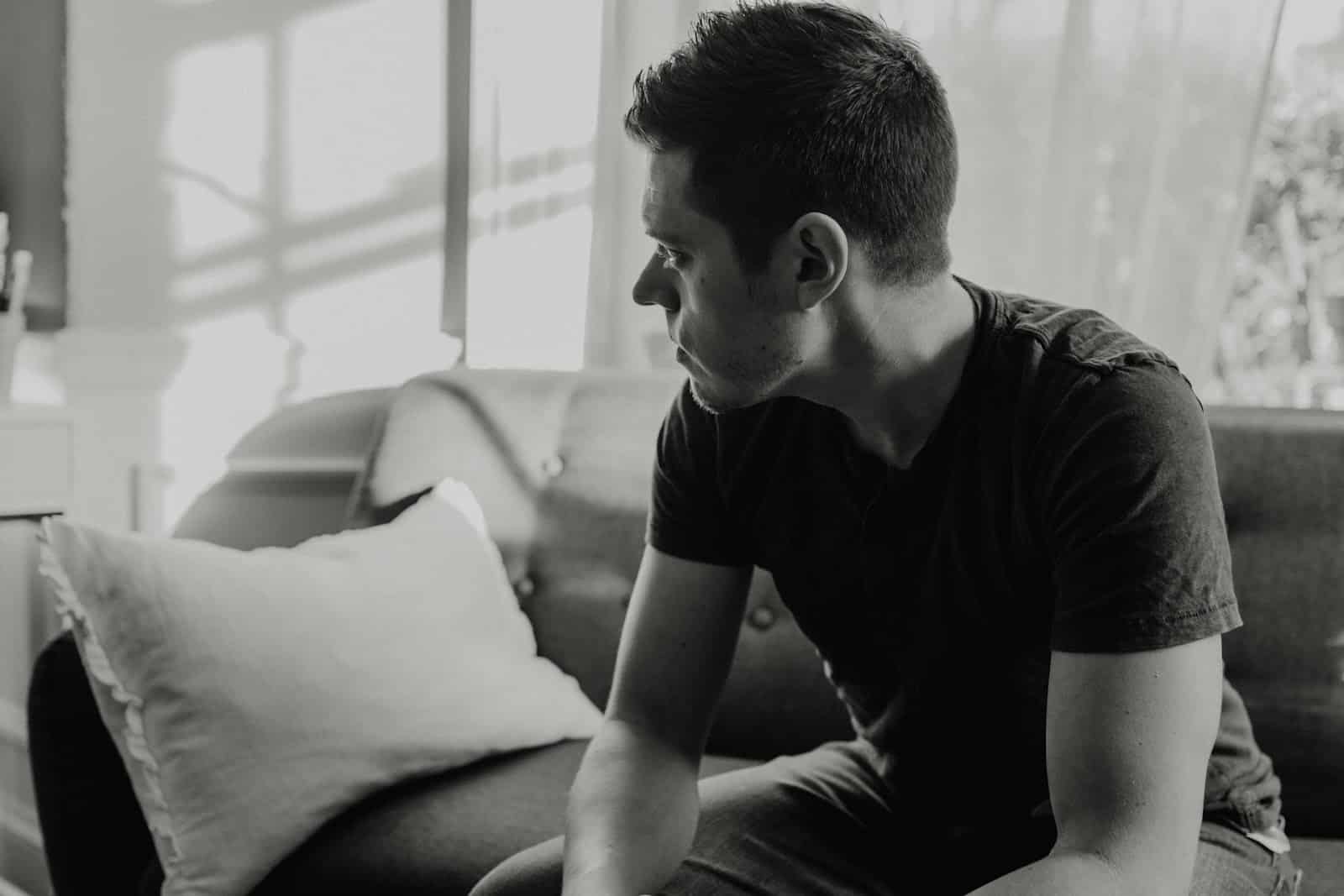 pensive man indoors