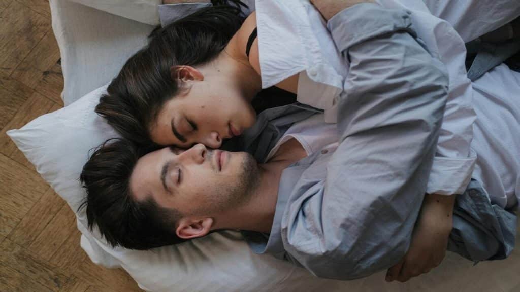 A couple cuddling at home