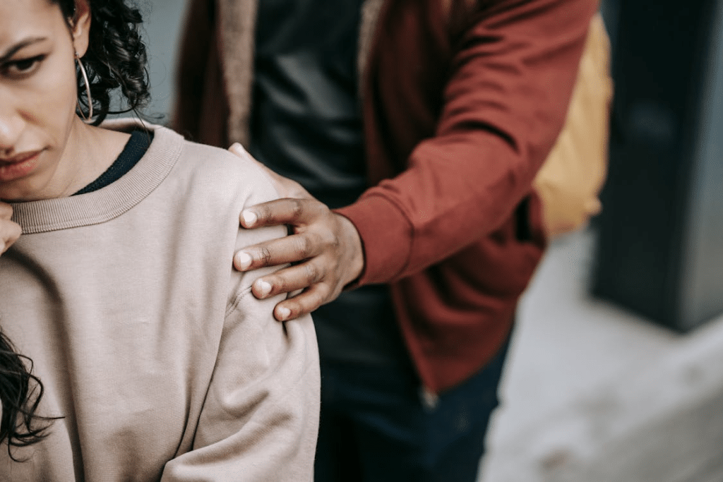 Couple having argument with each other in street
