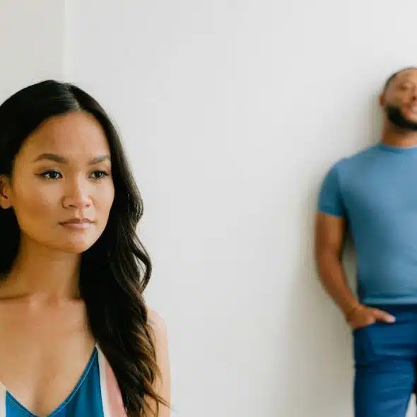 A woman being distant from a man