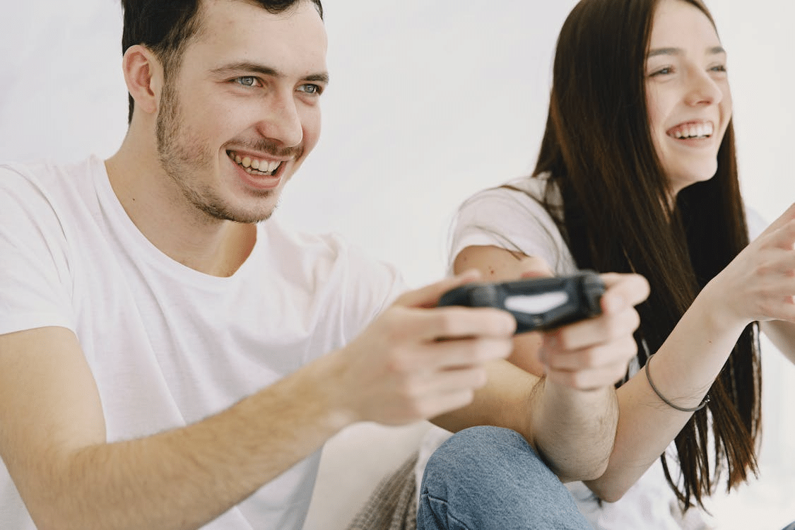 A man and a woman playing video games