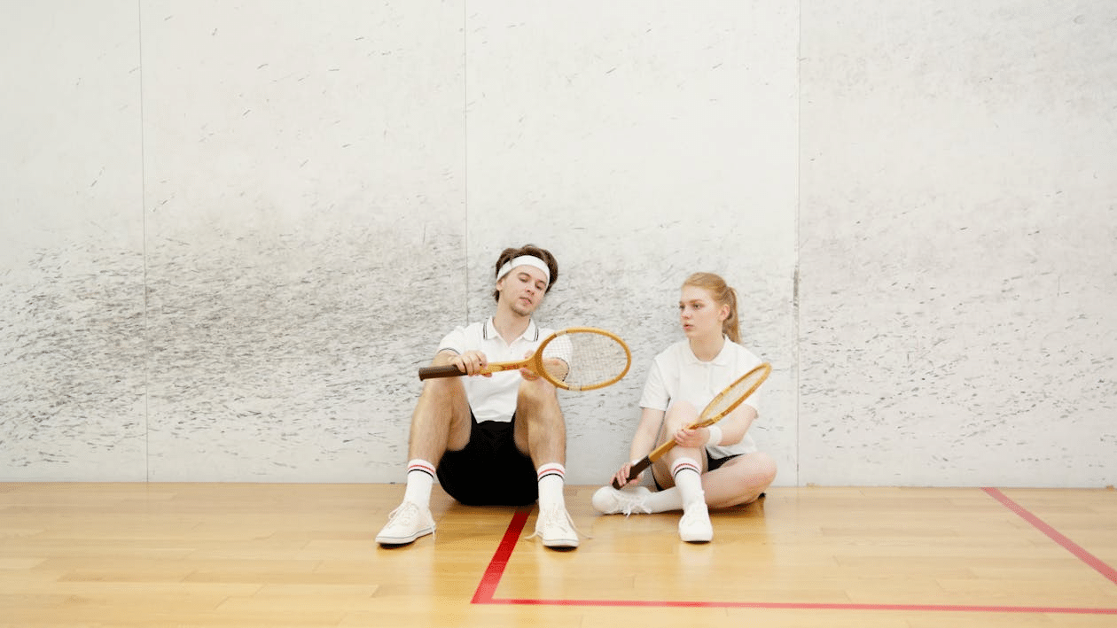 A couple playing badminton