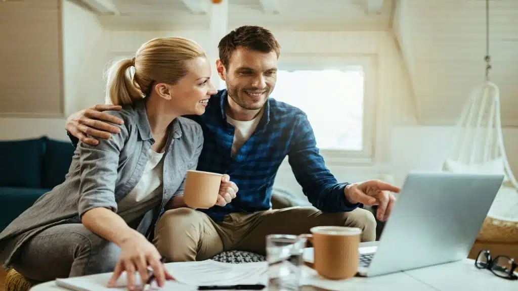 A couple studying their finances together 