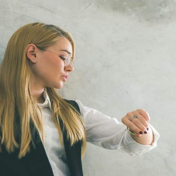 A woman checking the time
