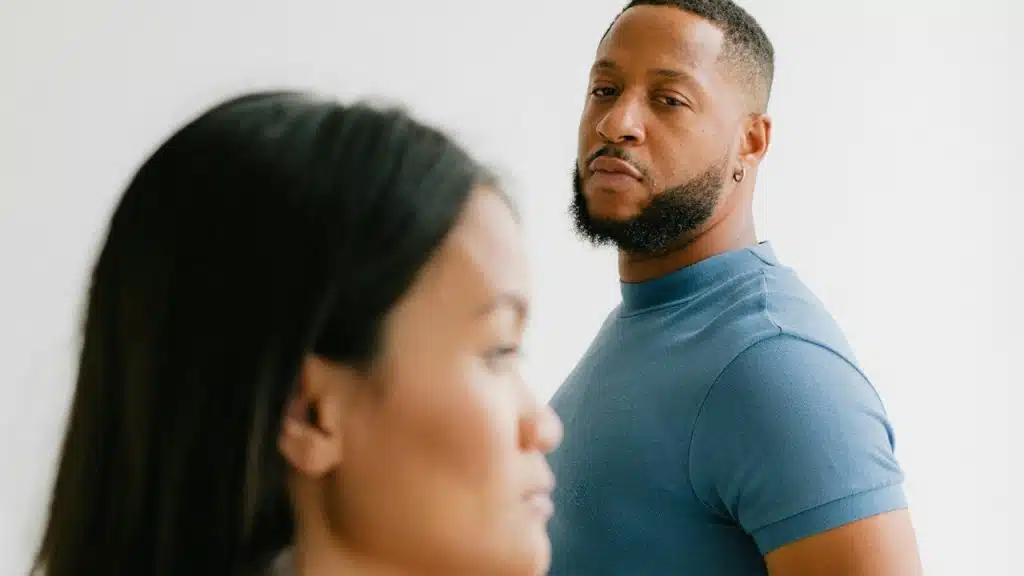 A man and a woman standing next to each other.
