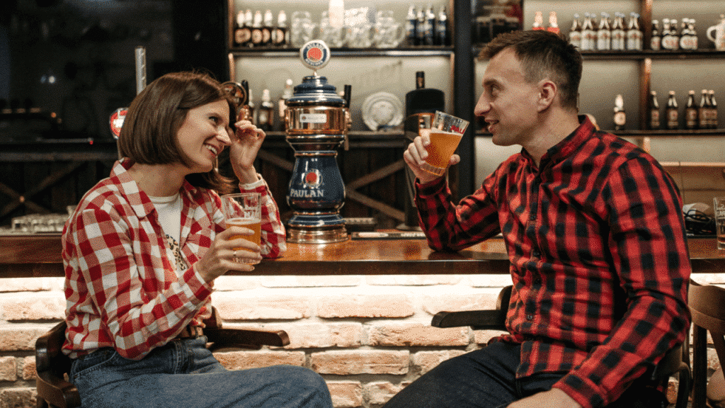 A couple having beer during a date
