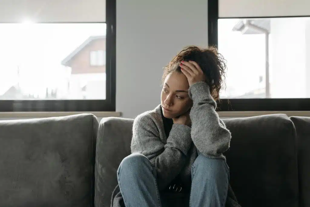 Woman thinking and looking frustrated
