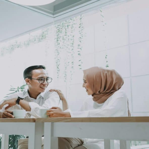 man and woman talking during first meeting