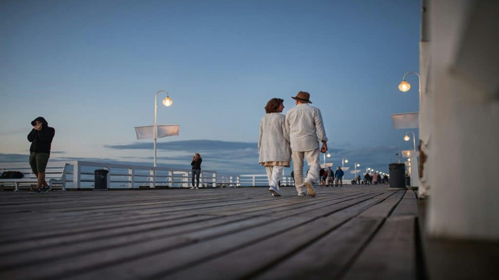 couple walking together at sunset