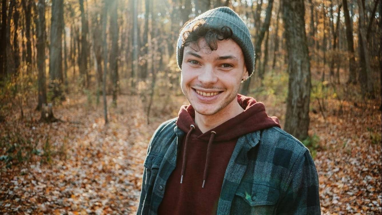 man smiling outdoors