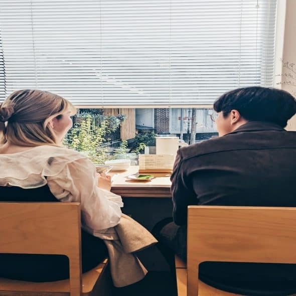 couple talking at café table