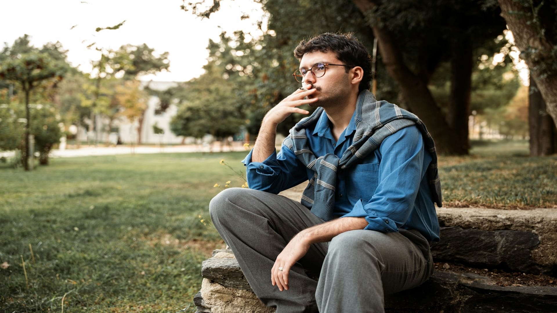 man sitting quietly thinking