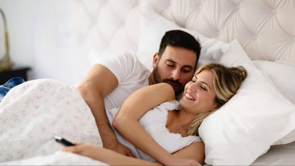 A man hugging a woman
