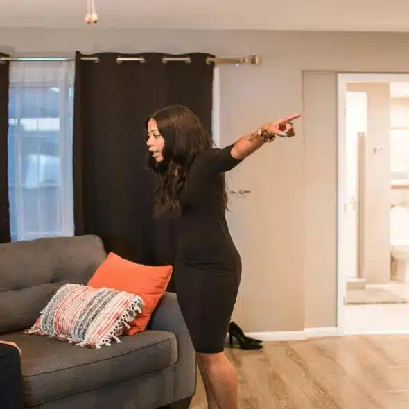A couple arguing in the living room