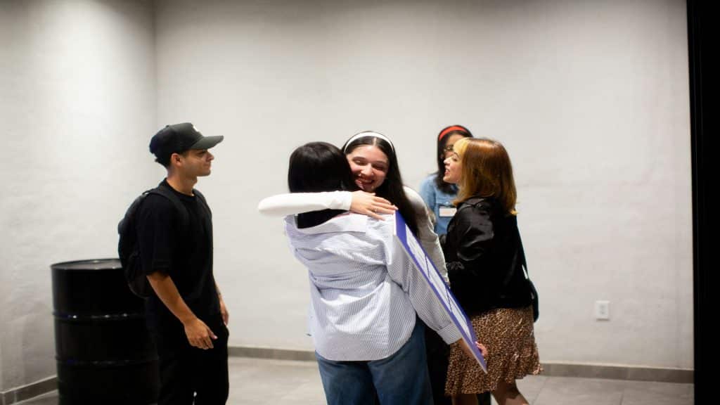 Friends greeting each other