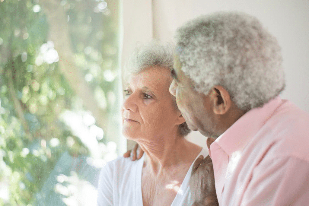 A couple looking outside