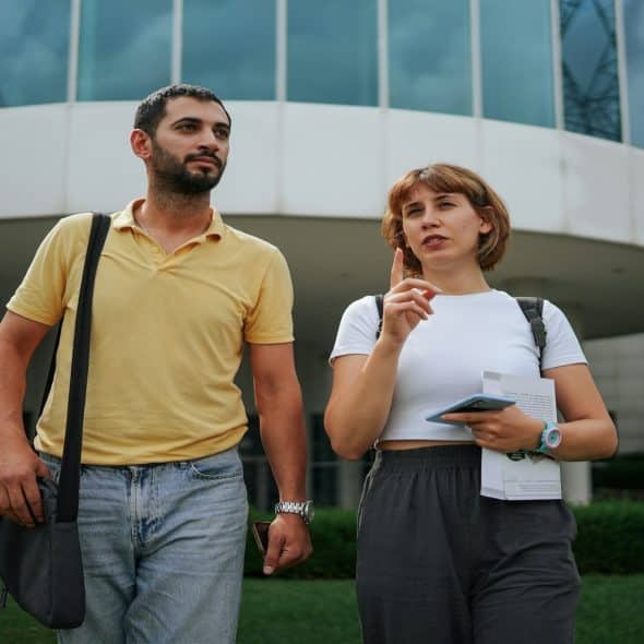 couple walking together during thoughtful conversation