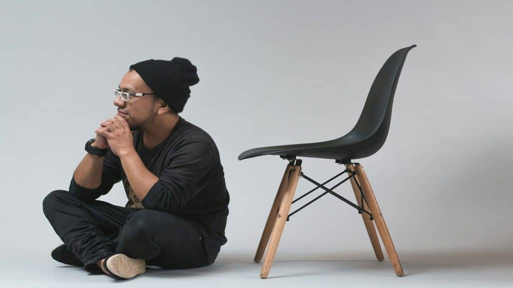 person sitting thoughtfully