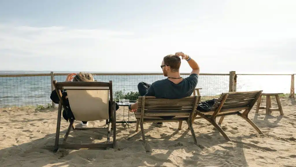 man appearing relaxed while partner looks distant